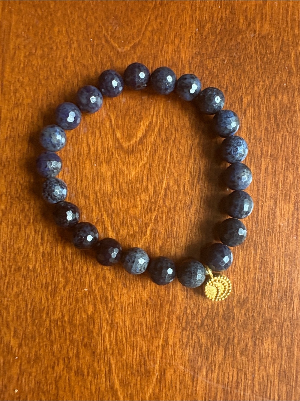 Satya Faceted Dark Blue Bead Stretch Bracelet with Gold Moon Charm